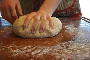 kneading bread dough