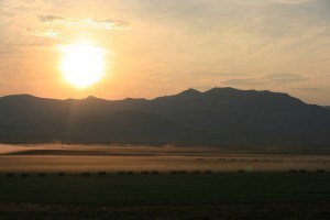 hay bales at sunset