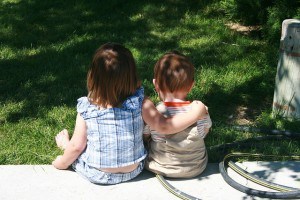 IMG_3092- siblings sitting together