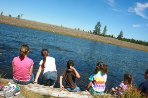 Throwing rocks in Madison River