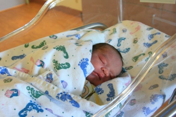 Henry in hospital bassinet