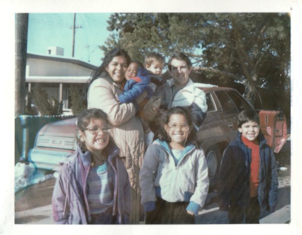 That's me front and center. The others are left to right: Vanessa, my mom holding Marcus (a foster baby), my dad holding Jonathan, Pere.