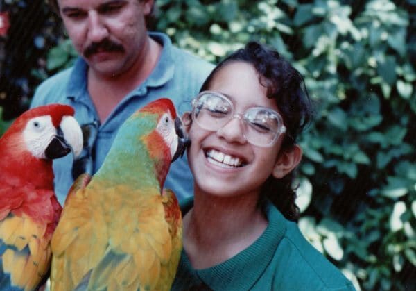 montse-getting-a-kiss-from-a-parrot