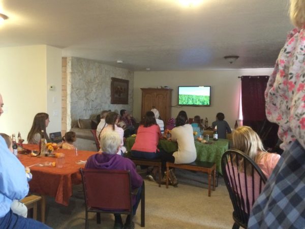 Watching a farm movie Sara put together from this past year.