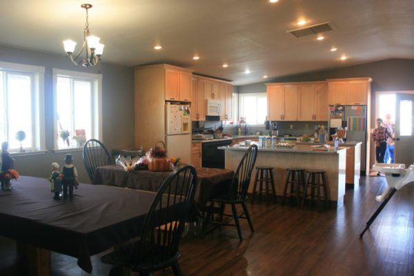 View of the dining room and kitchen from the doorway that leads into our living room