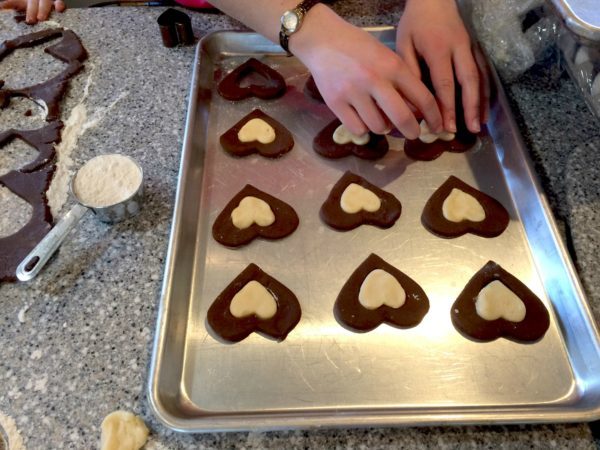 Regular sugar cookie heart center in a large chocolate heart Valentine's cookies